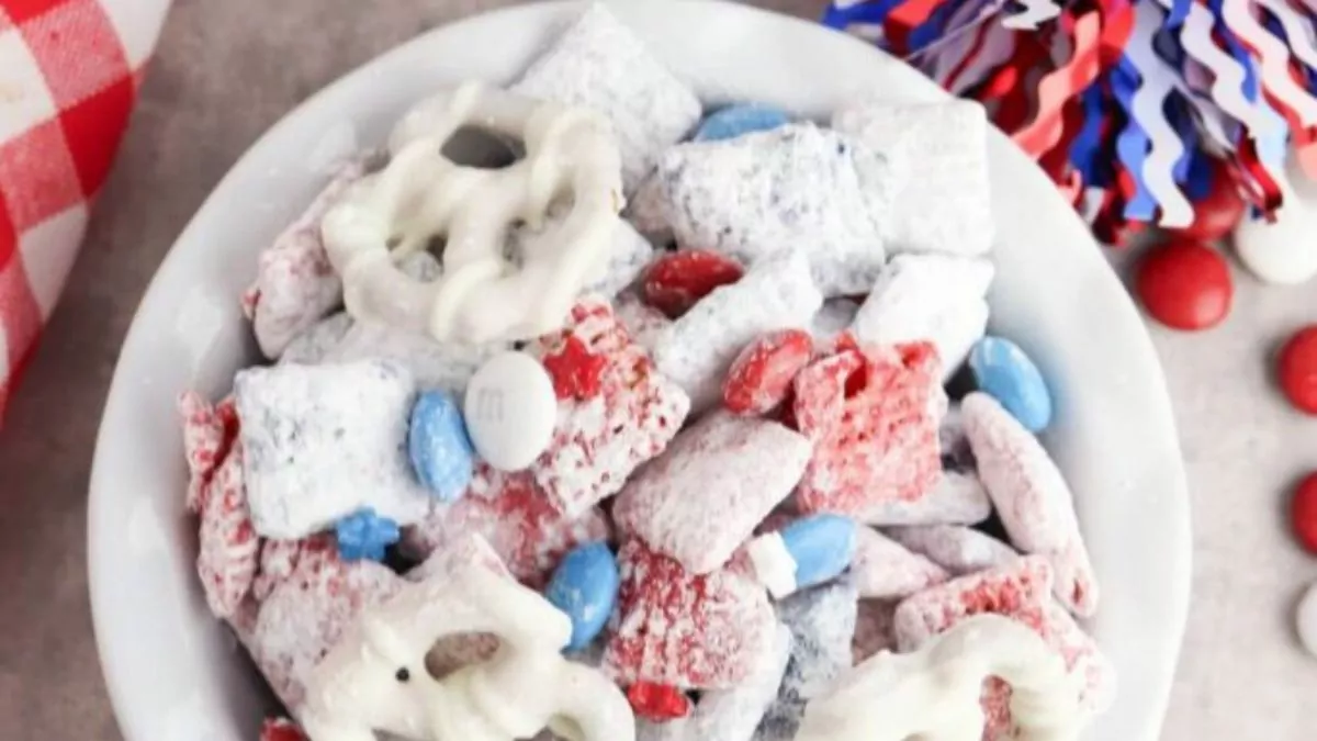 a bowl of puppy chow with red, white and blue colors.