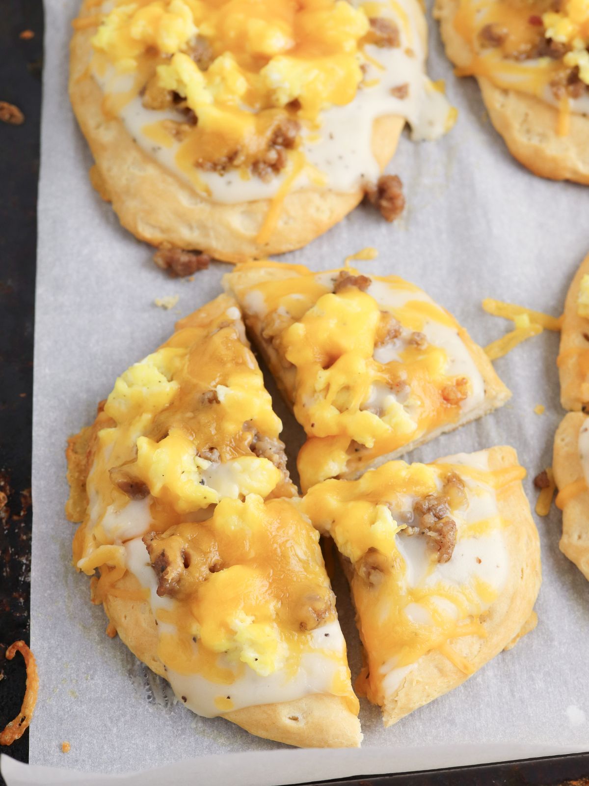 Breakfast pizza cut into quarters