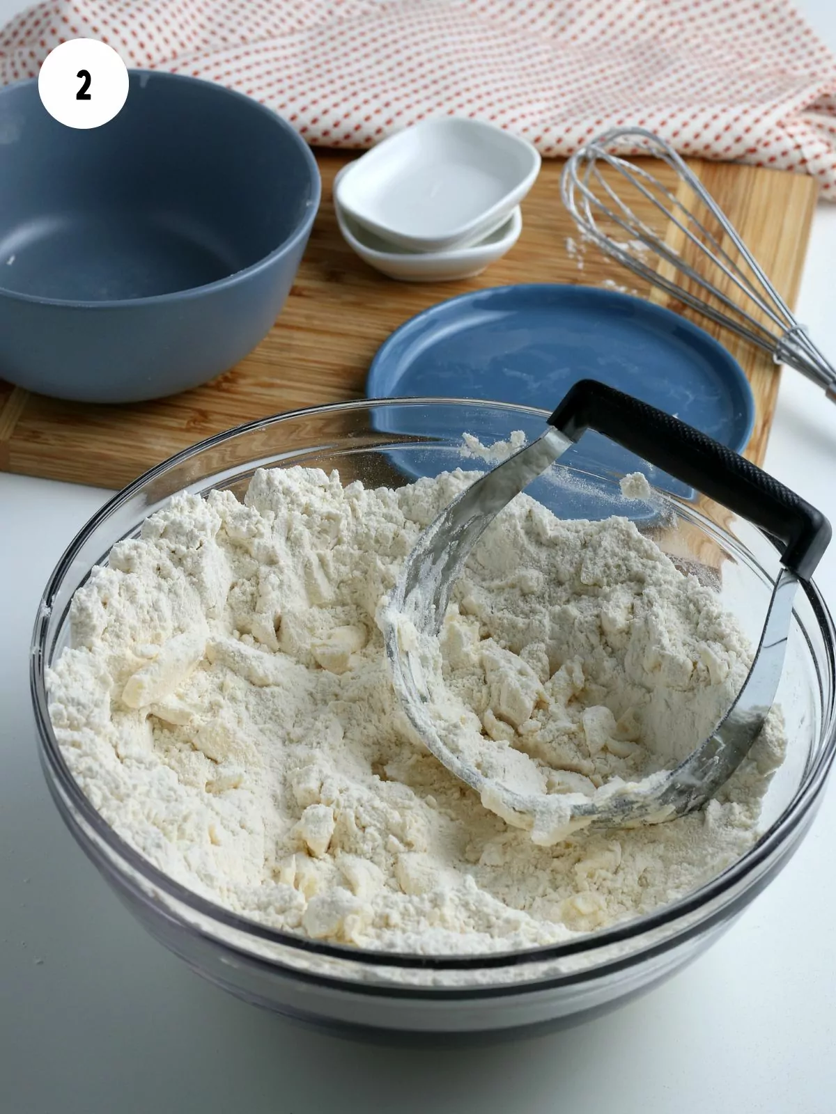 mix butter into flour mixture with pastry blender