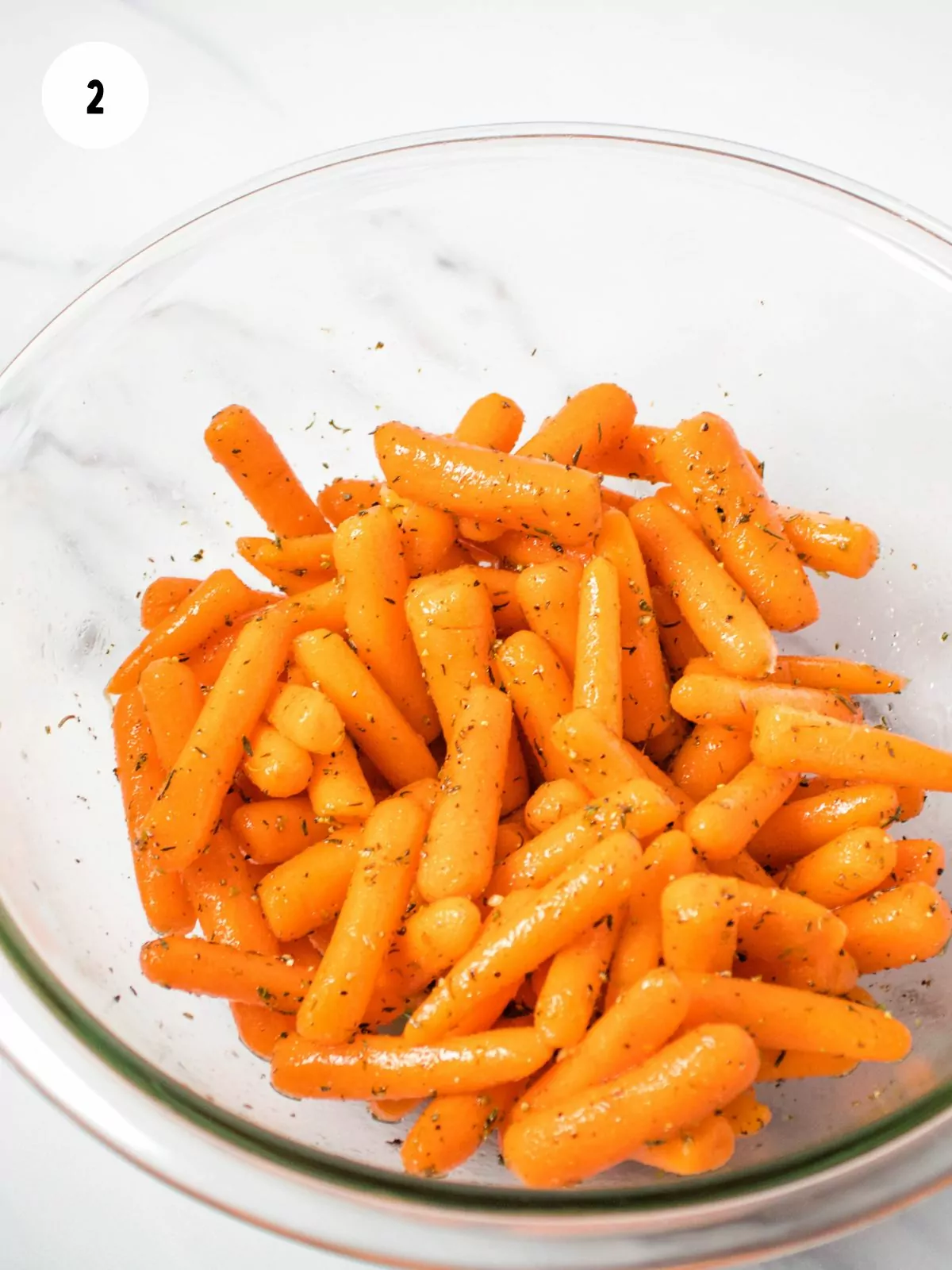 carrots tossed in oil and seasoning