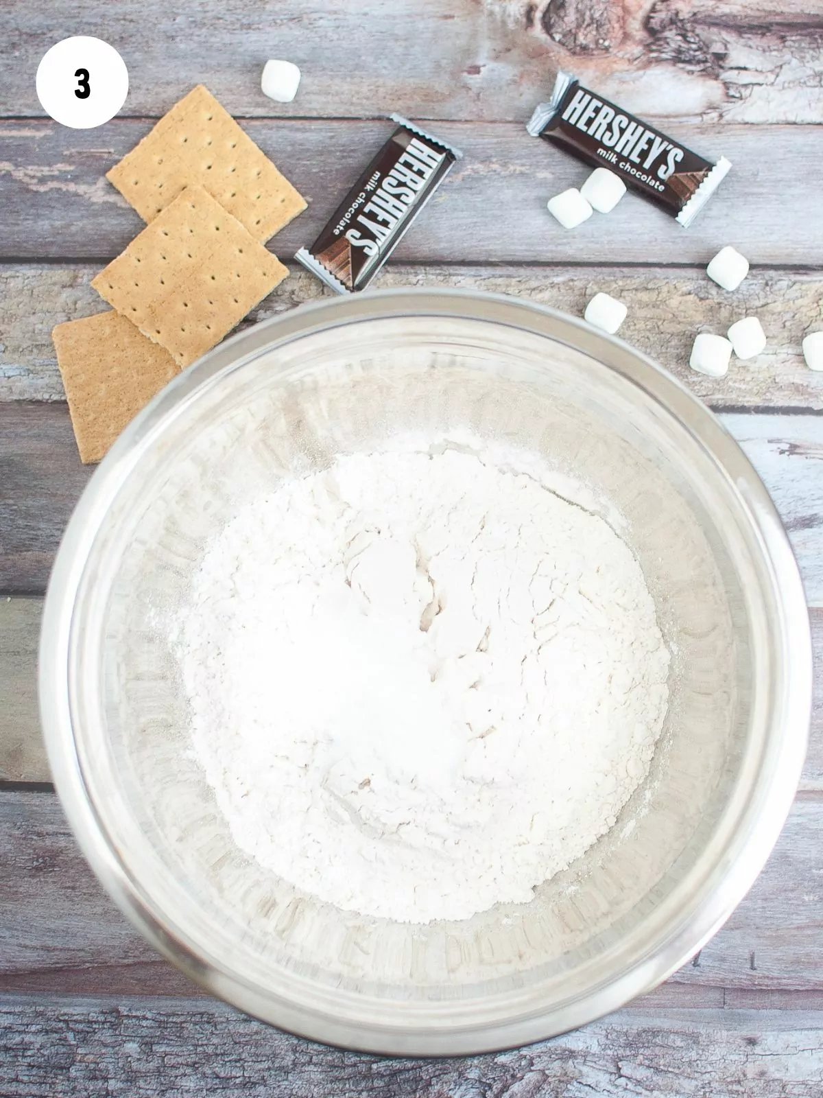 flour, salt, baking powder, and cornstarch mixed in a clear mixing bowl