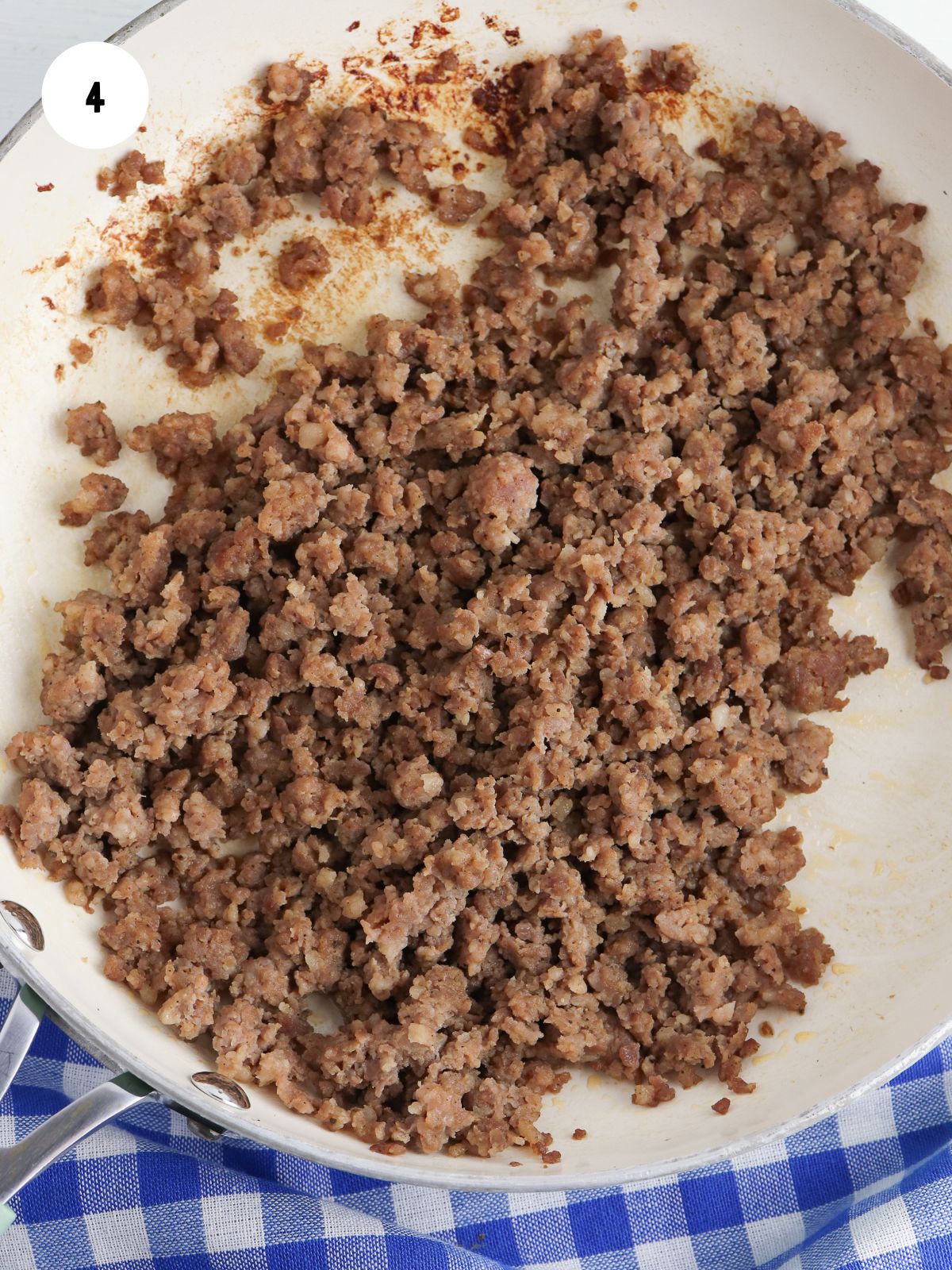 Browned sausage in a skillet