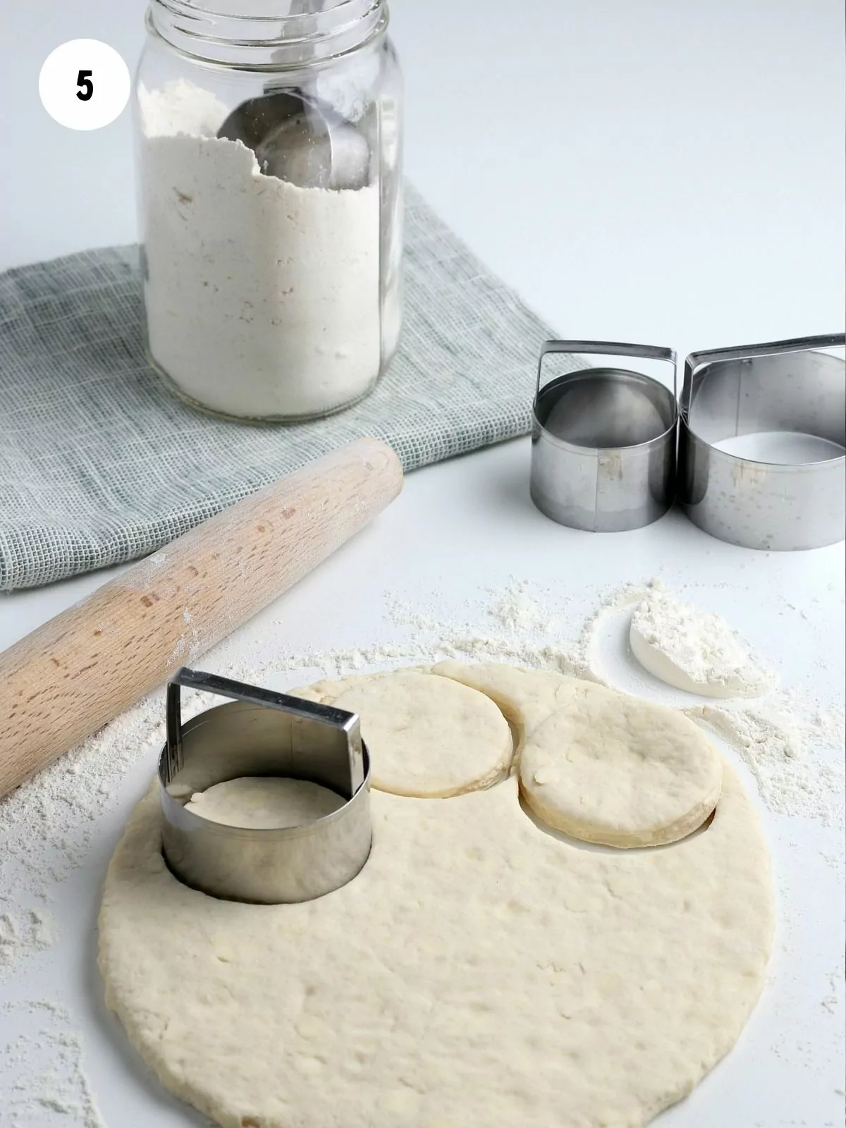 Roll the dough and cut round shapes