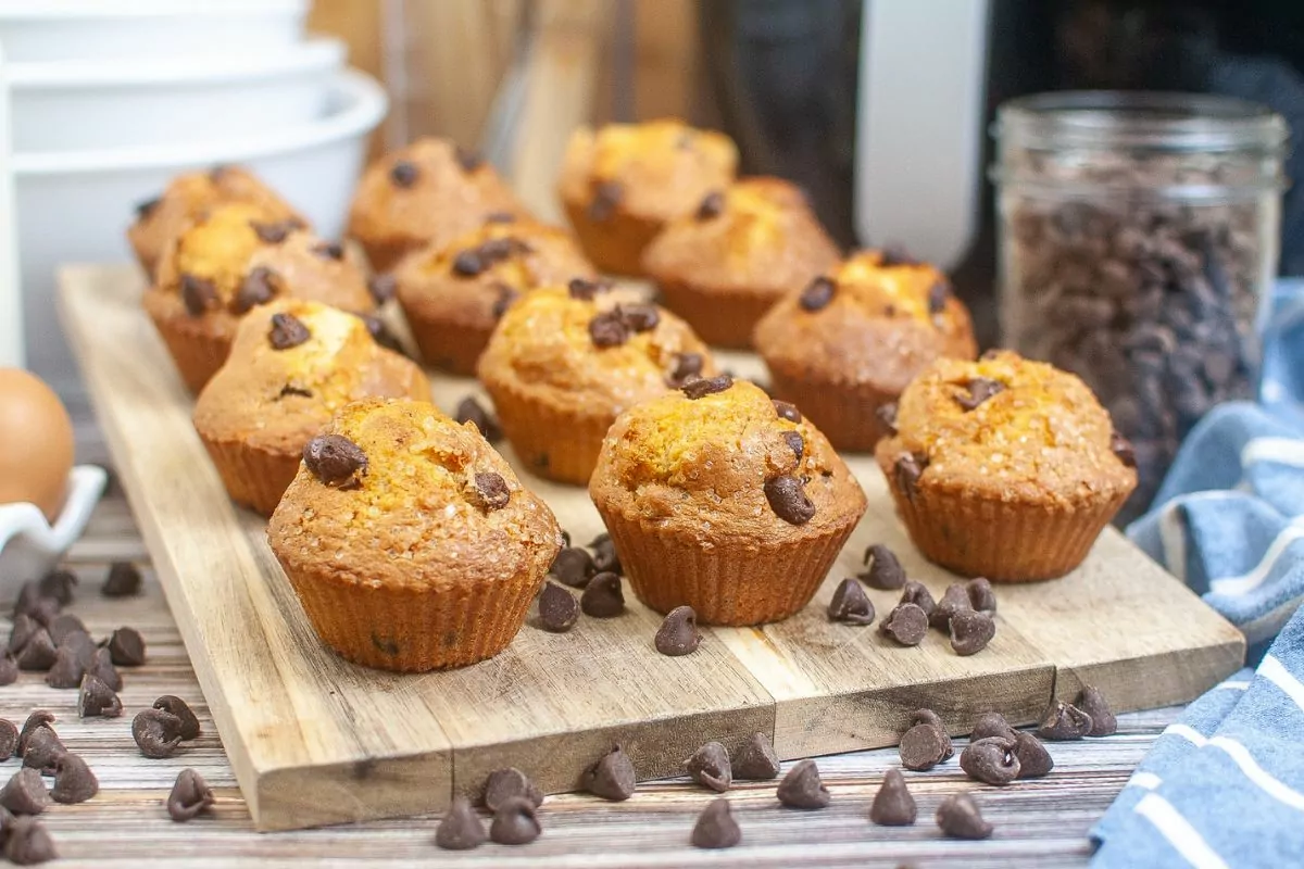 Air Fryer Chocolate Chip Muffins served on a wood board