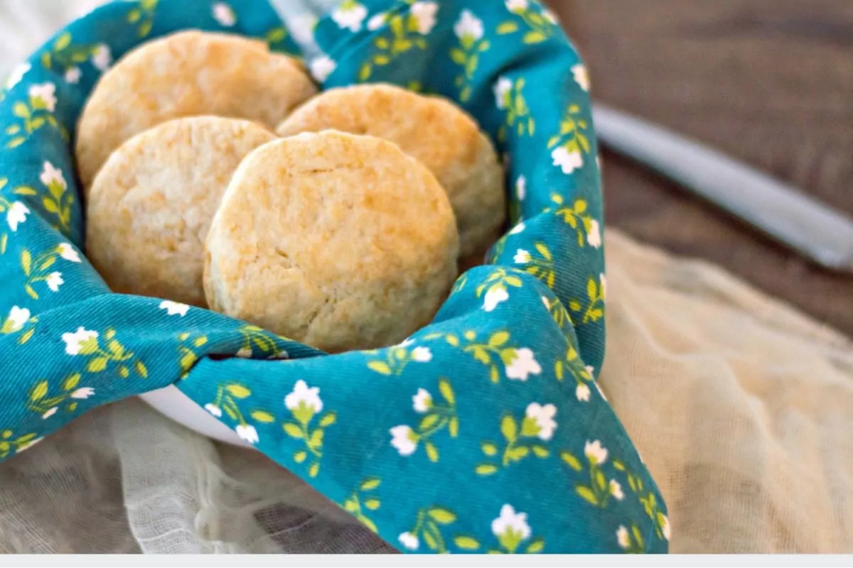 a basket of 4 homemade biscuits.