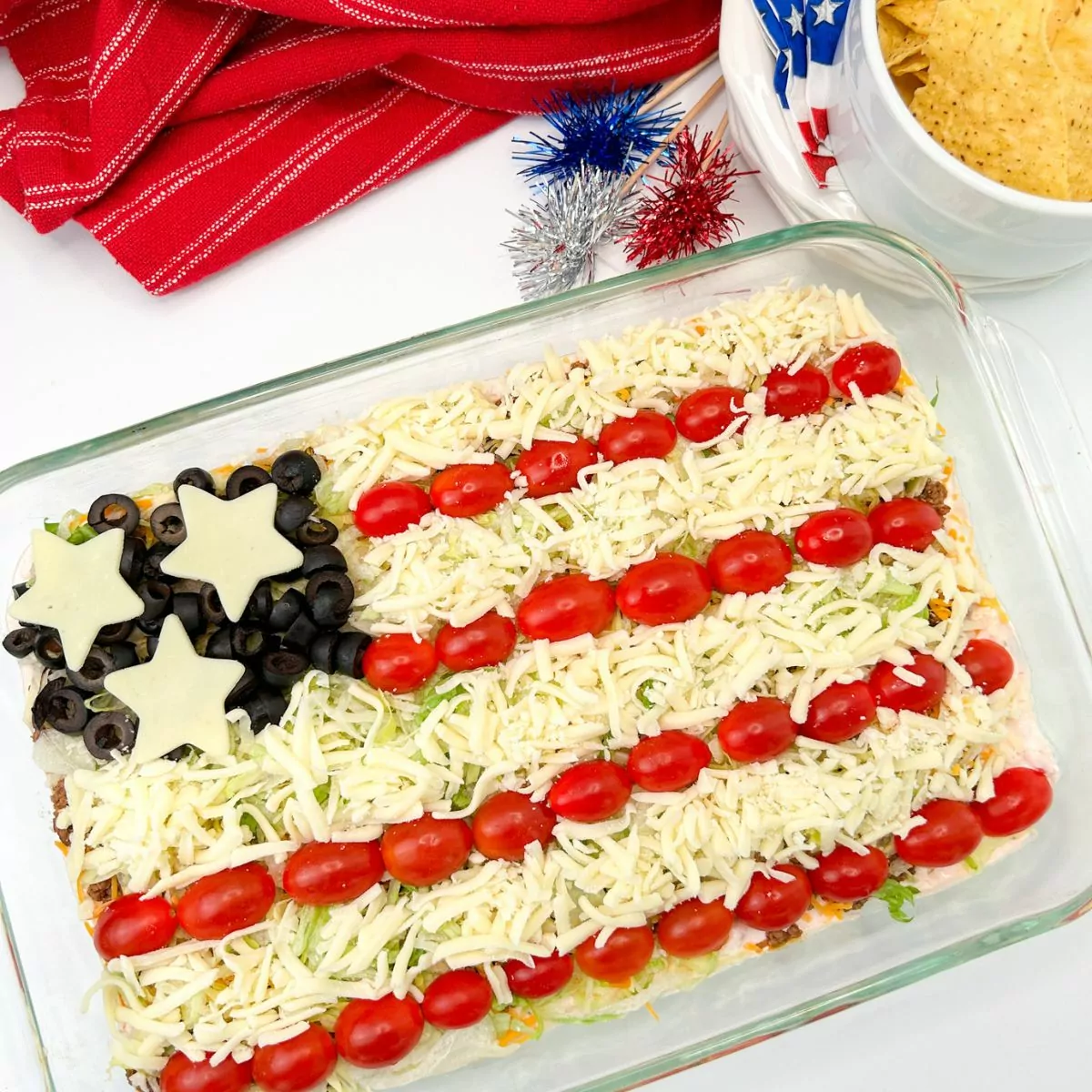 A delicious arranged in a casserole dish, showcasing the red, white, and blue colors of the American flag.