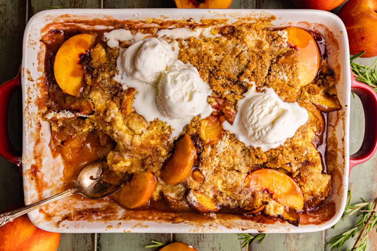 peach cobbler in baking dish.