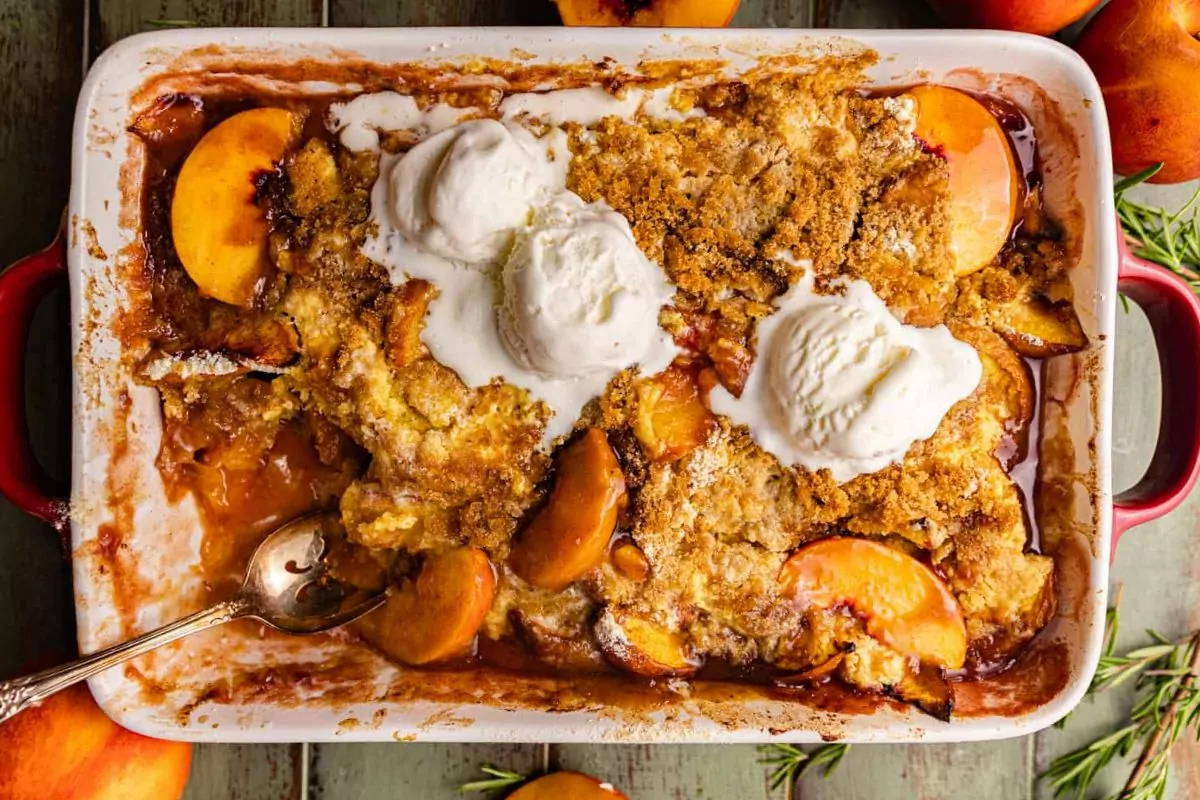 peach cobbler in baking dish.