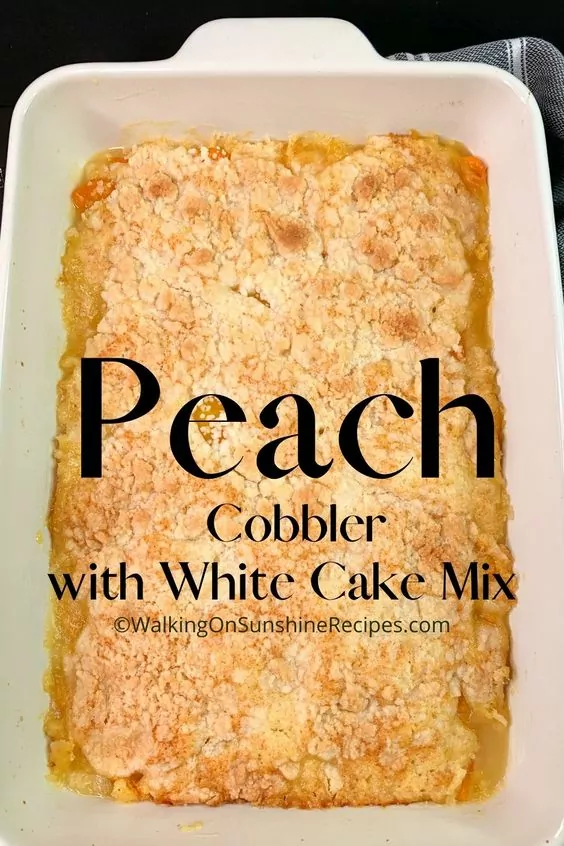 peach cobbler baked in casserole dish.