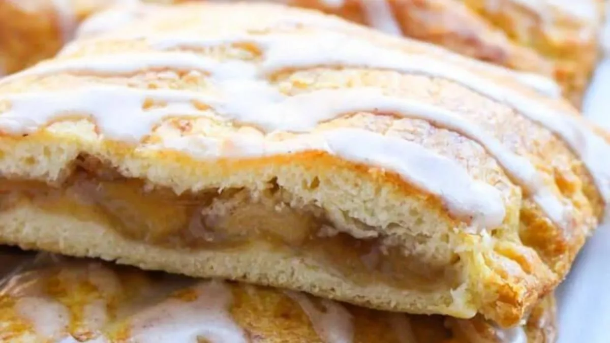 a stack of shortcut strudels with apple pie filling and cinnamon glaze.