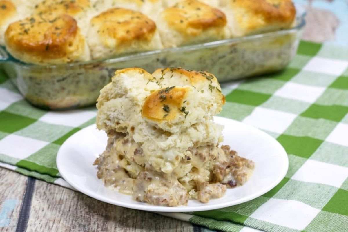 a serving of biscuits and gravy casserole on a plate.