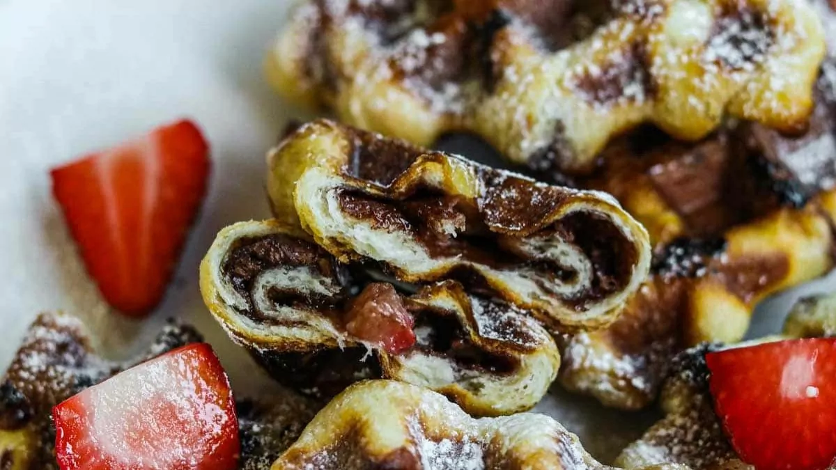 chocolate and strawberry stuffed crescent rolls cooked in a waffle iron.