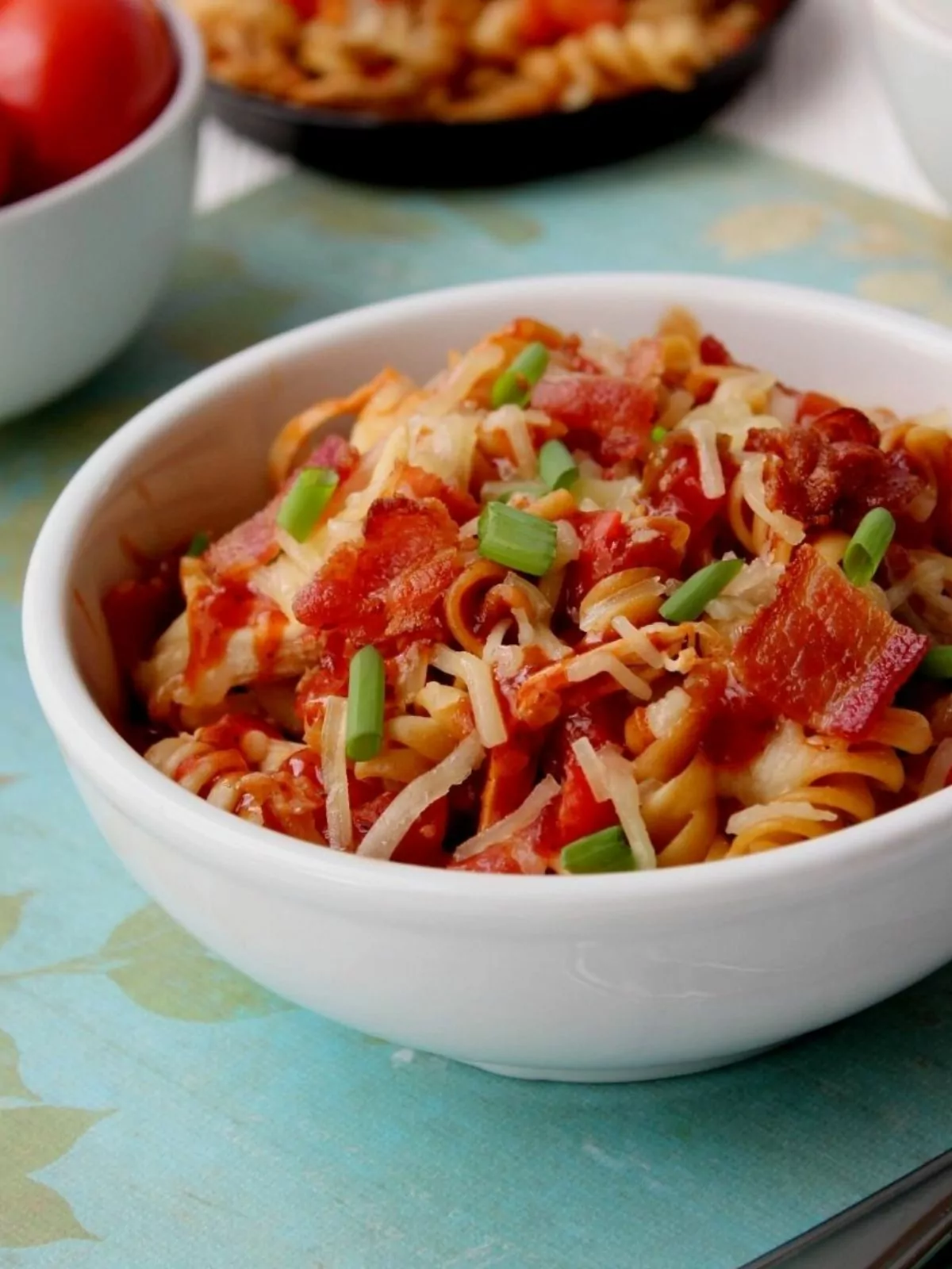 chicken pasta casserole in white bowl.