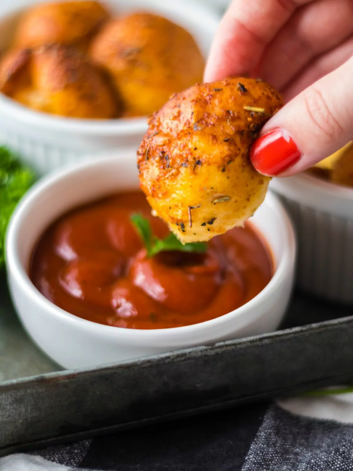 pizza bread pulled apart to dip in marinara