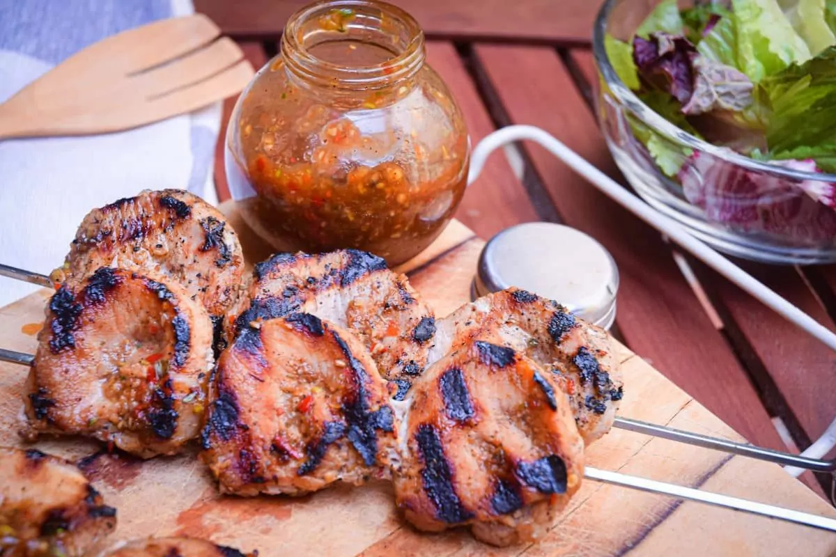 skewers of pork tenderloin brushed and bbq'd with jerk sauce