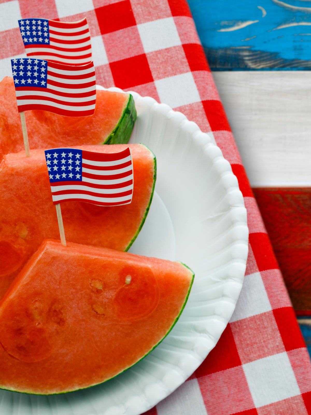 watermelon with small flag toothpicks.