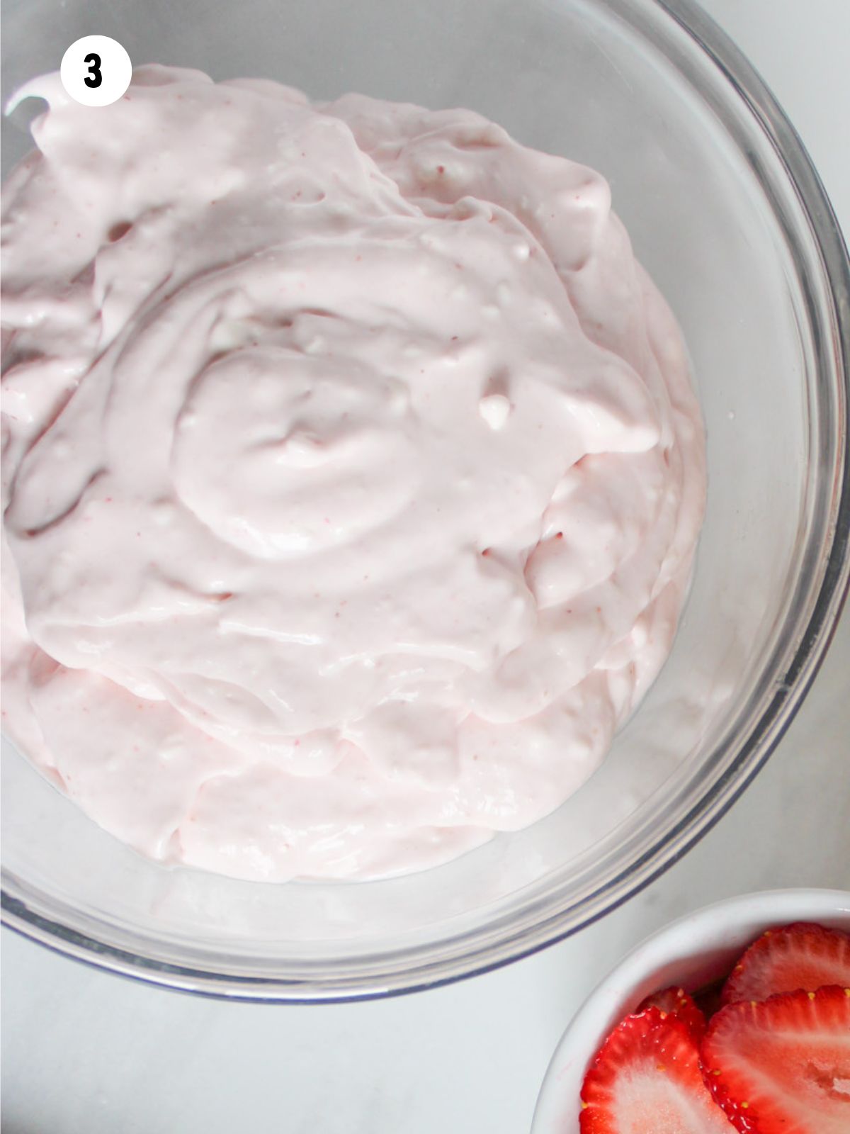 strawberry cream cheese in a bowl.