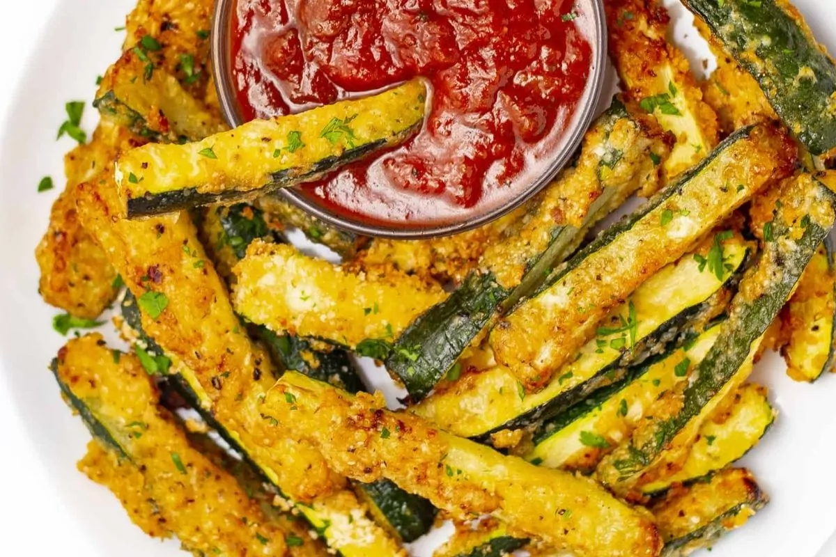 crispy zucchini fries with ketchup.