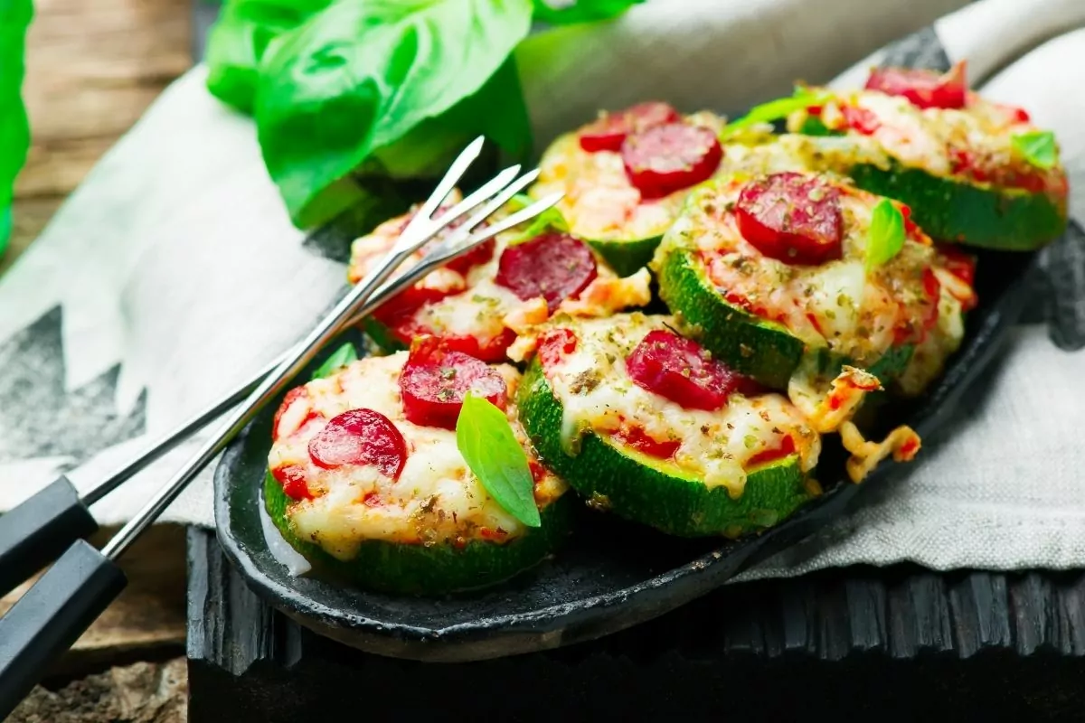 zucchini pizza bites with small pieces of pepperoni.