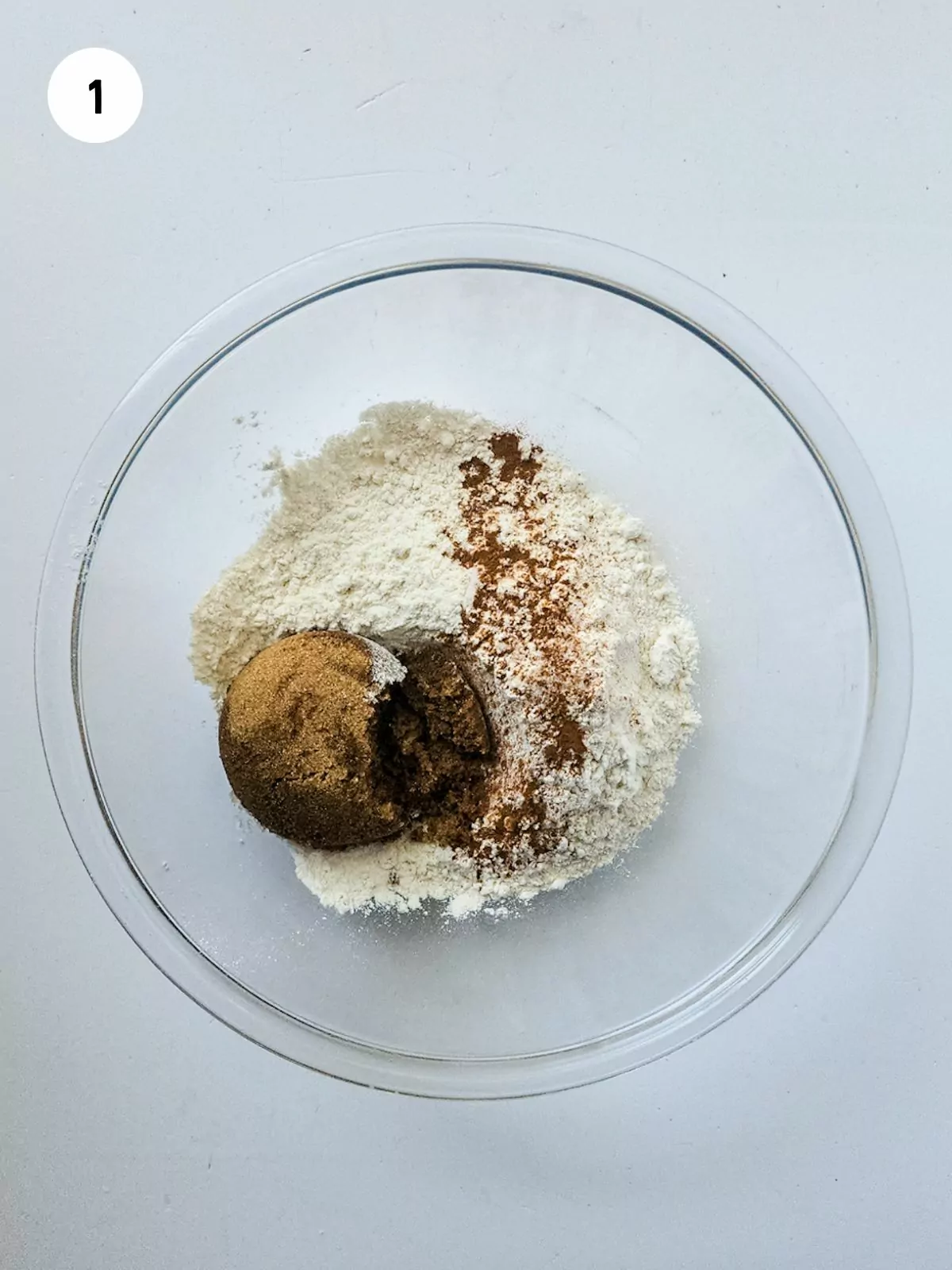 Flour, brown sugar, cinnamon and salt in a clear mixing bowl