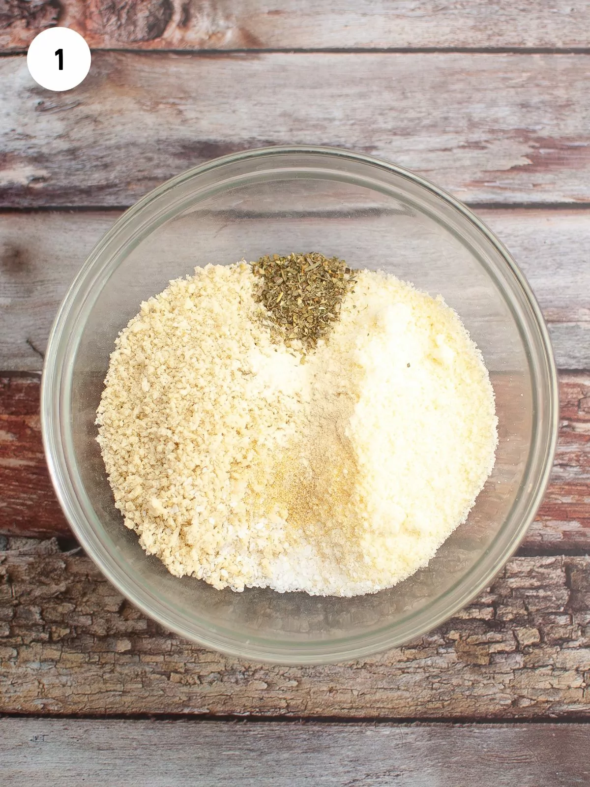 panko, parmesan, seasonings added to a mixing bowl