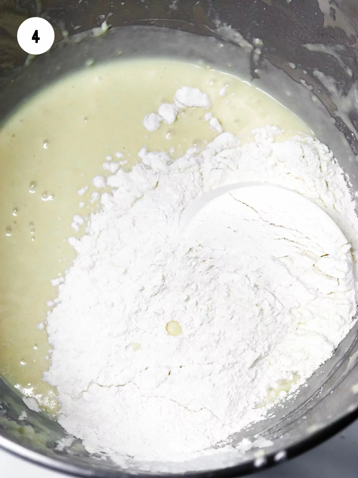 a cup of flour added to the mixture in the mixing bowl