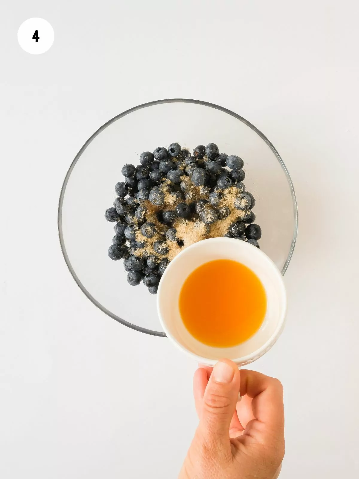 blueberries with sugar, orange juice, and vanilla extract