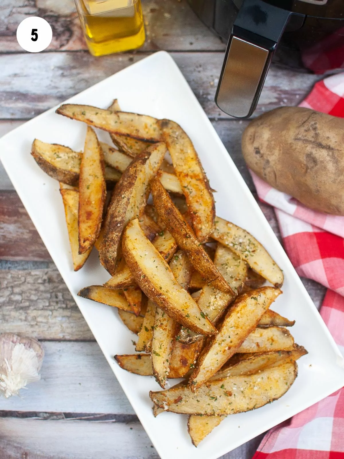 potato wedges on a rectangular serving platter