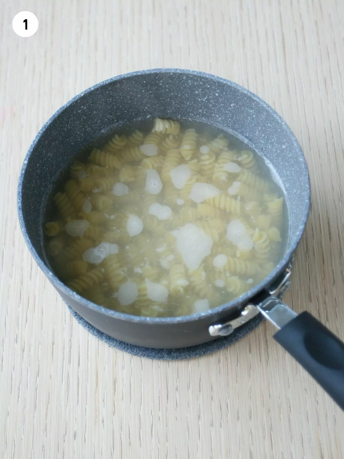 boiling pasta in water.