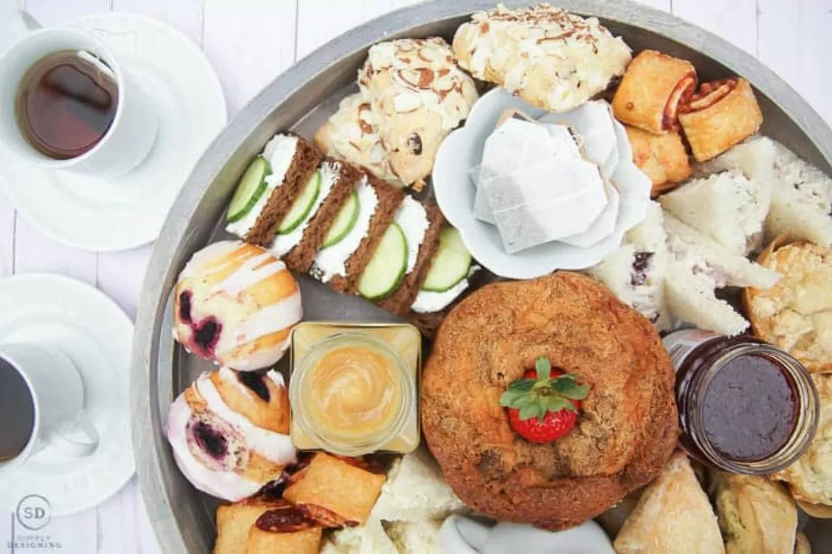 a charcuterie plate with bread and biscuits and a dip