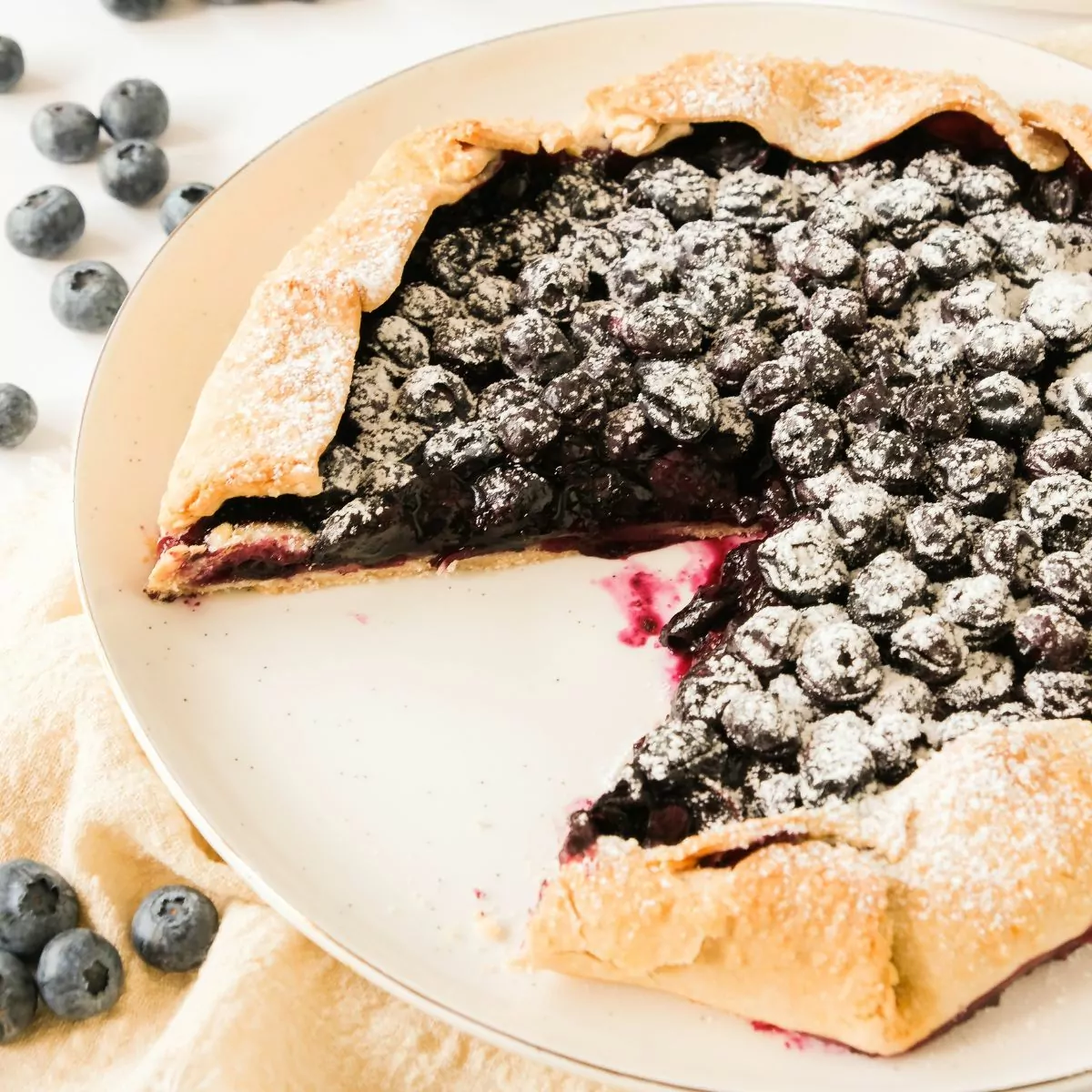 Blueberry Galette with a slice cut out