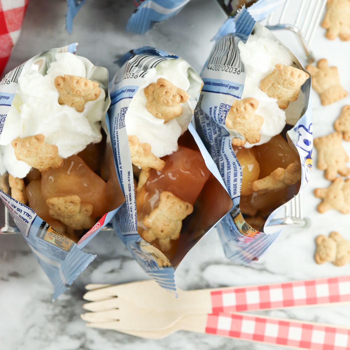 Walking Apple Pie overhead shot showing inside the bags and 2 forks