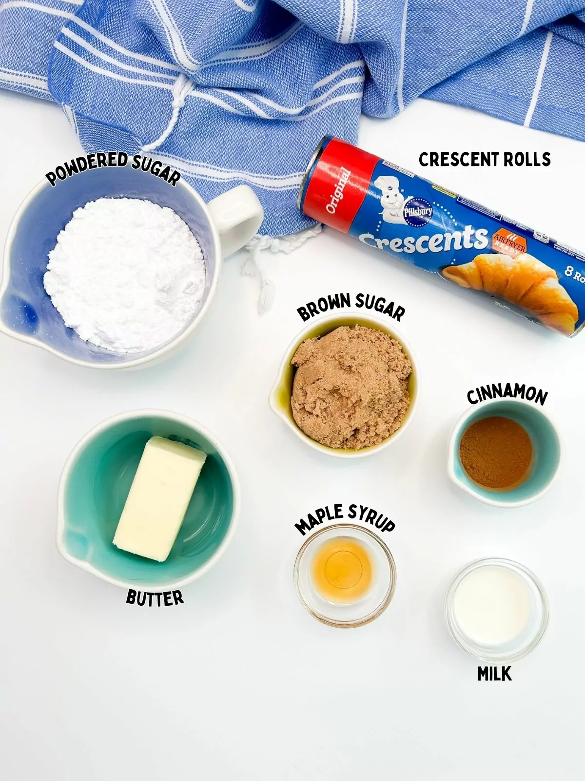 ingredients in small bowls for cinnamon rolls.