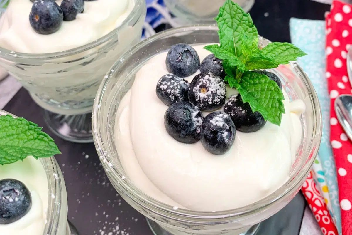 WW Cool Whip Pudding in glass dessert cups with blueberries and fresh mint sprigs.