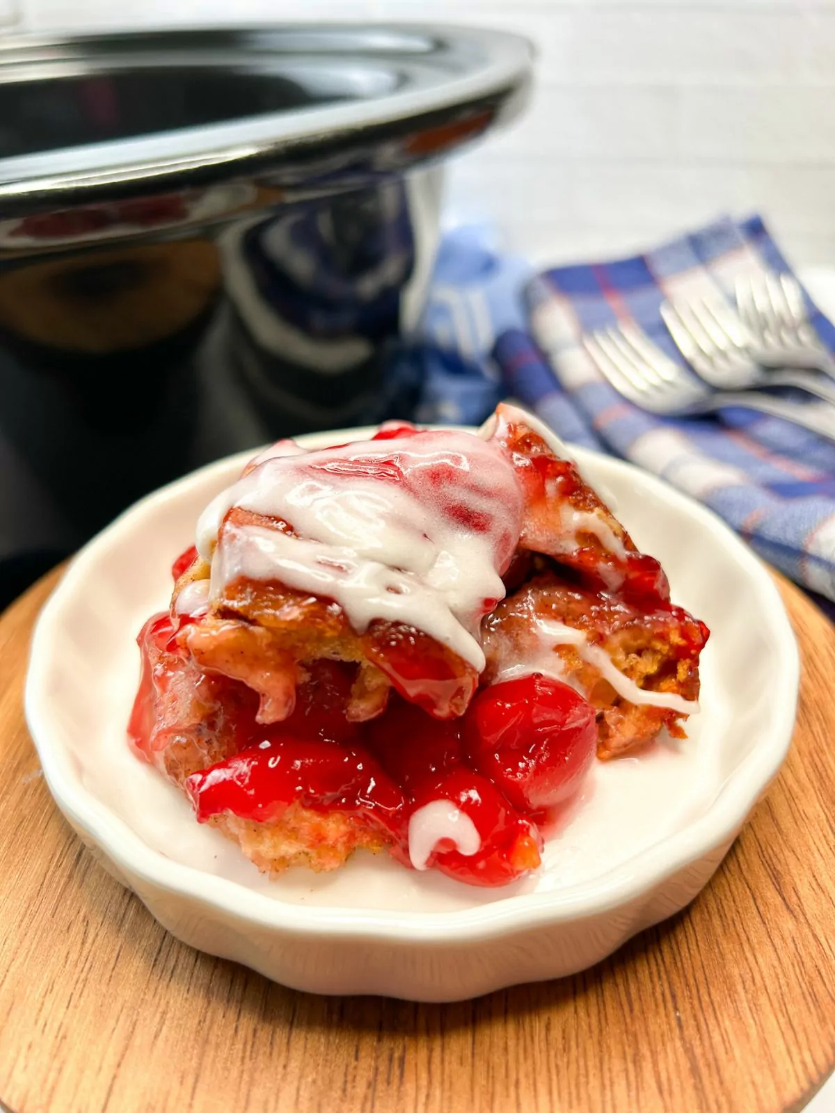 close up of the cherry cinnamon rolls plated