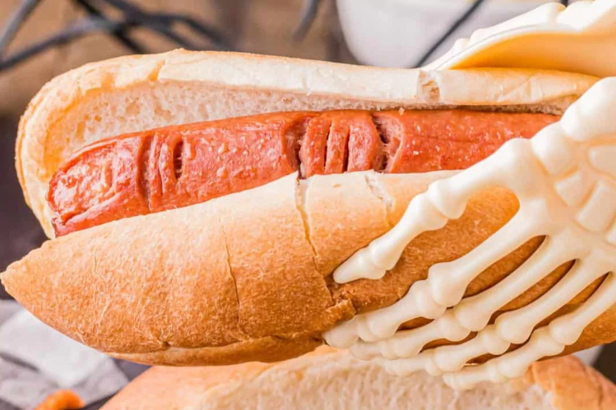 a bun filled with a hot dog that looks like a bloody finger.