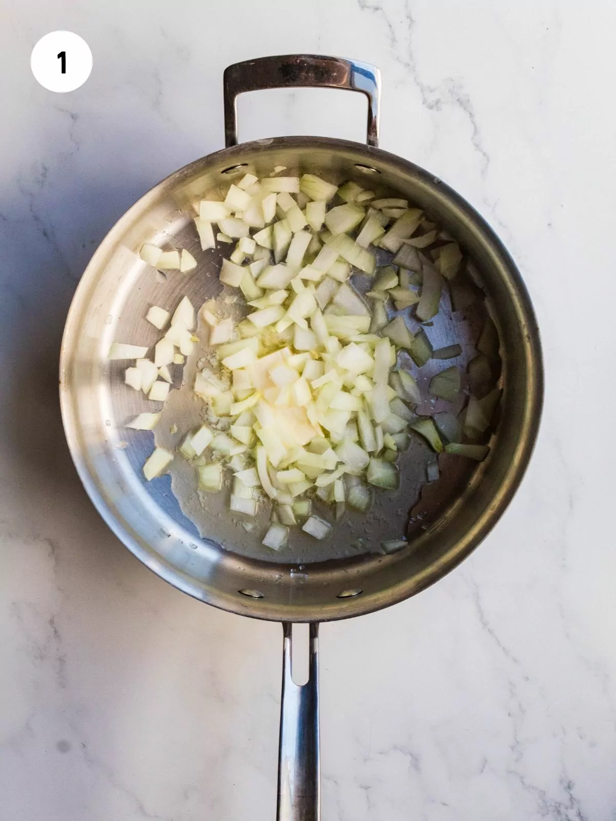 Pan with diced onions cooked in butter