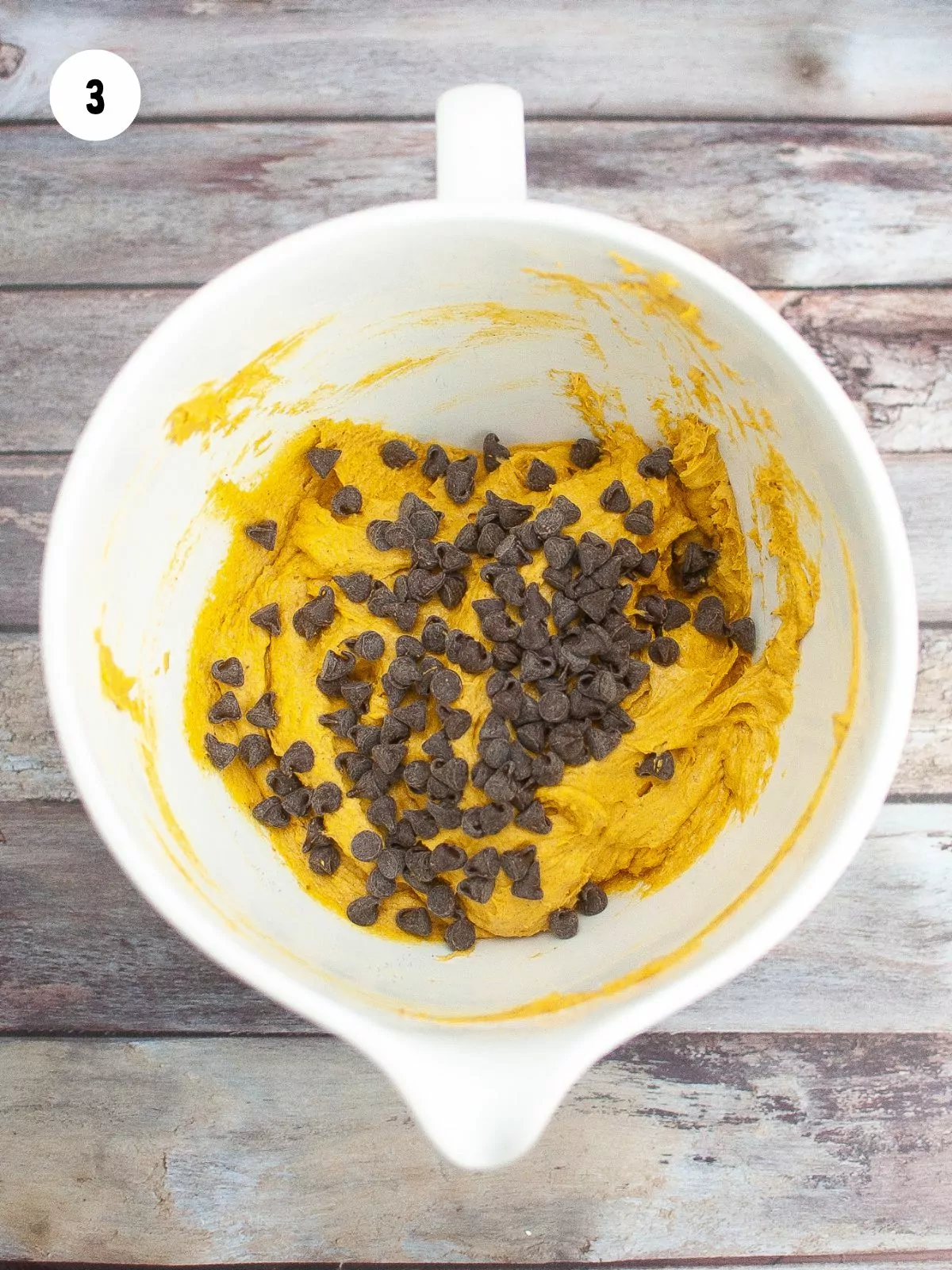 chocolate chips added to the pumpkin muffin batter