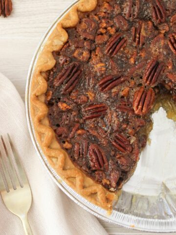 pecan pie with a slice removed