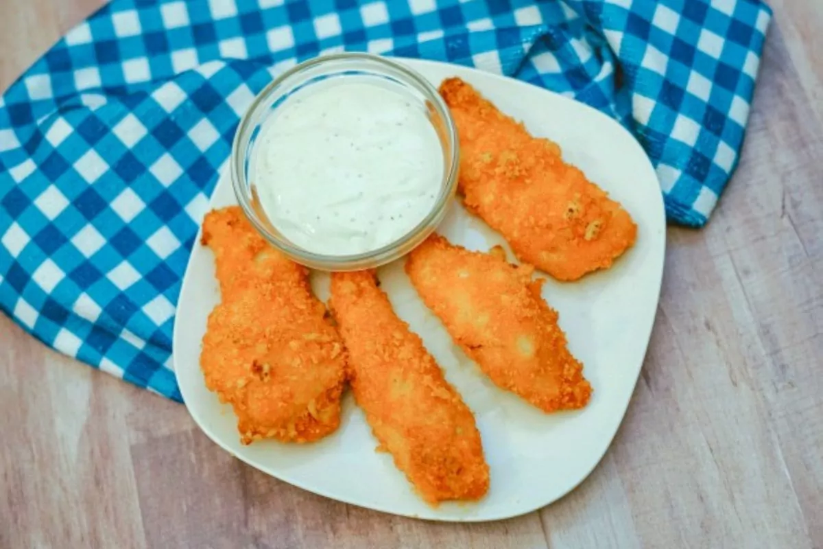 breaded chicken finger in a plate with dip sauce