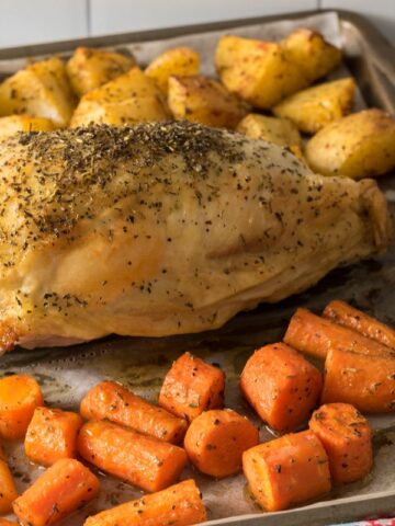 sheet pan chicken breast with carrots and potatoes.