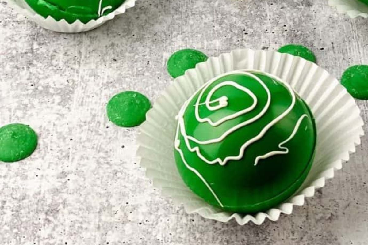 green cocoa bomb with white glaze