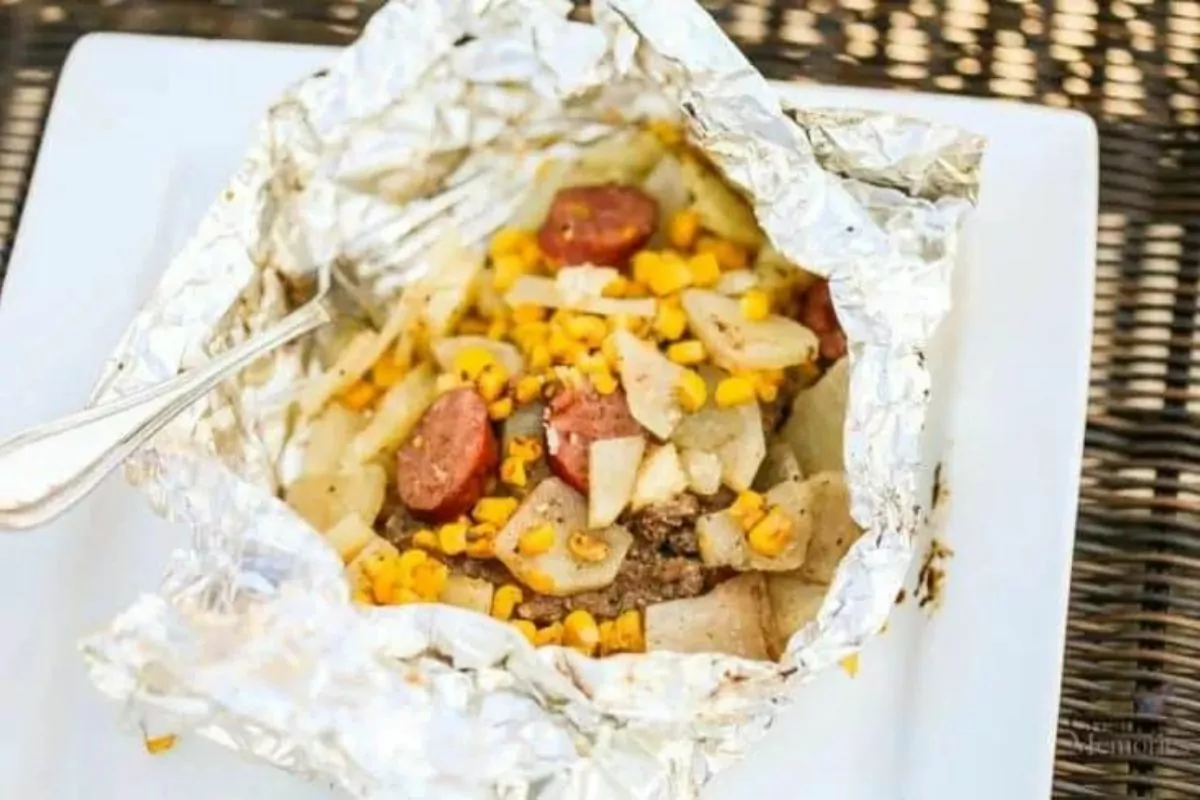 foil pack with hamburger, potatoes, corn and onions