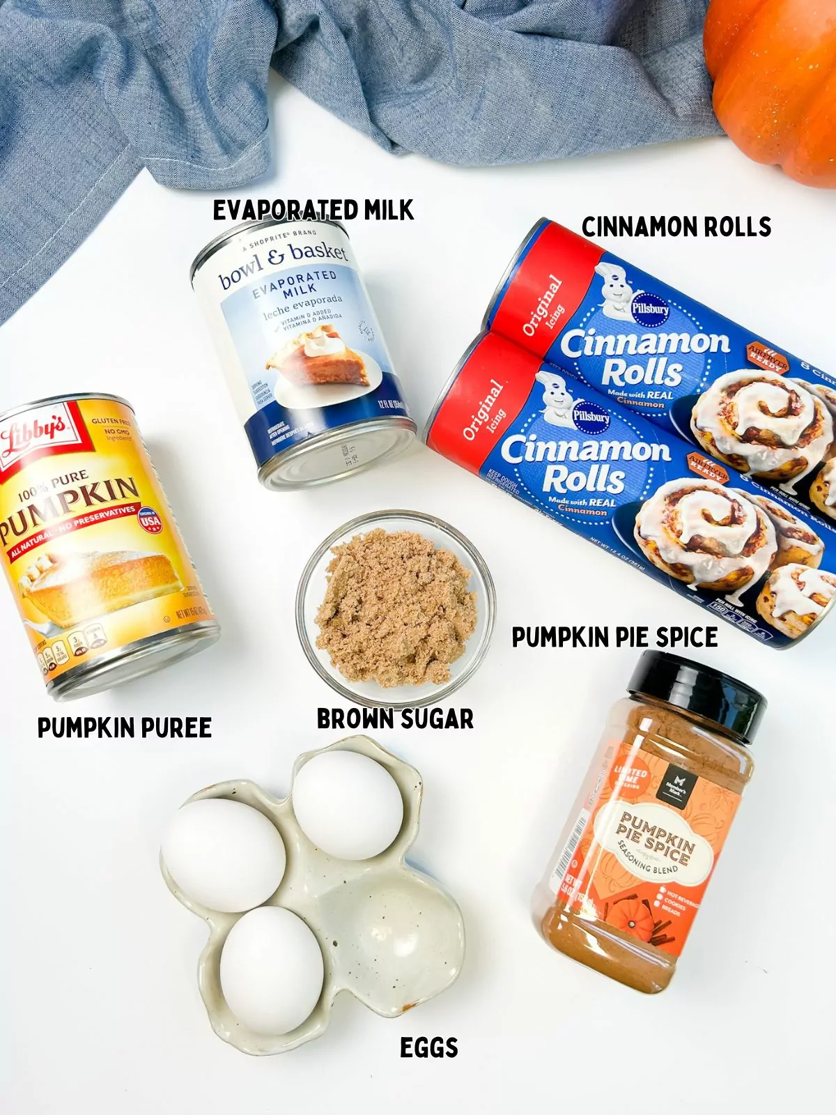 ingredients, eggs, pumpkin puree, evaporated milk, brown sugar, refrigerated cinnamon rolls and pumpkin pie spice.