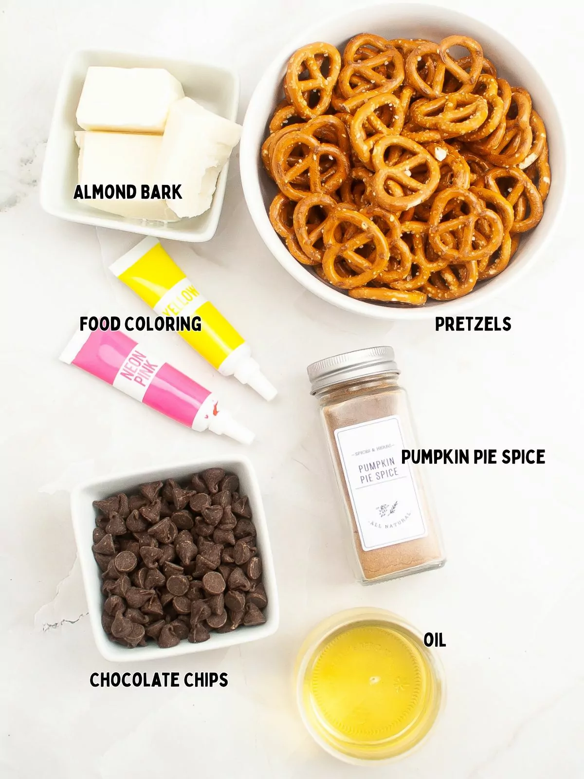 ingredients, chocolate chips, almond bark, pretzels, oil, pumpkin pie spice, food coloring.