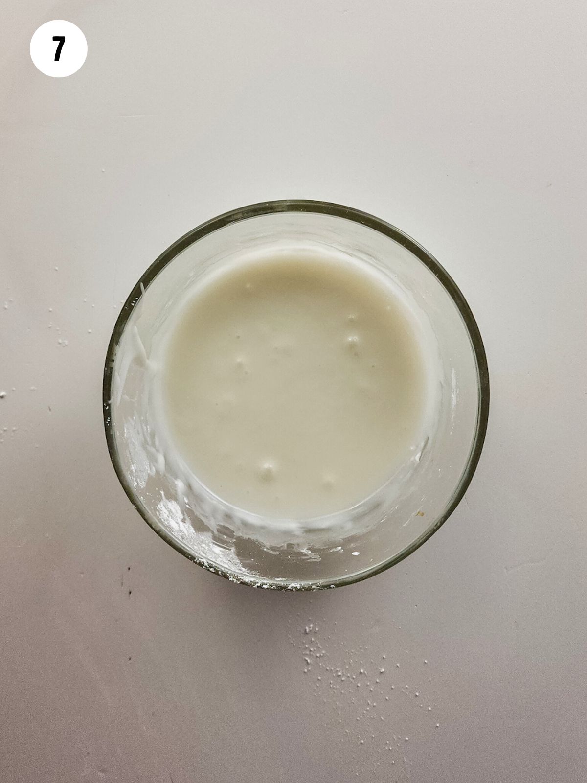 powdered sugar glaze in small bowl.