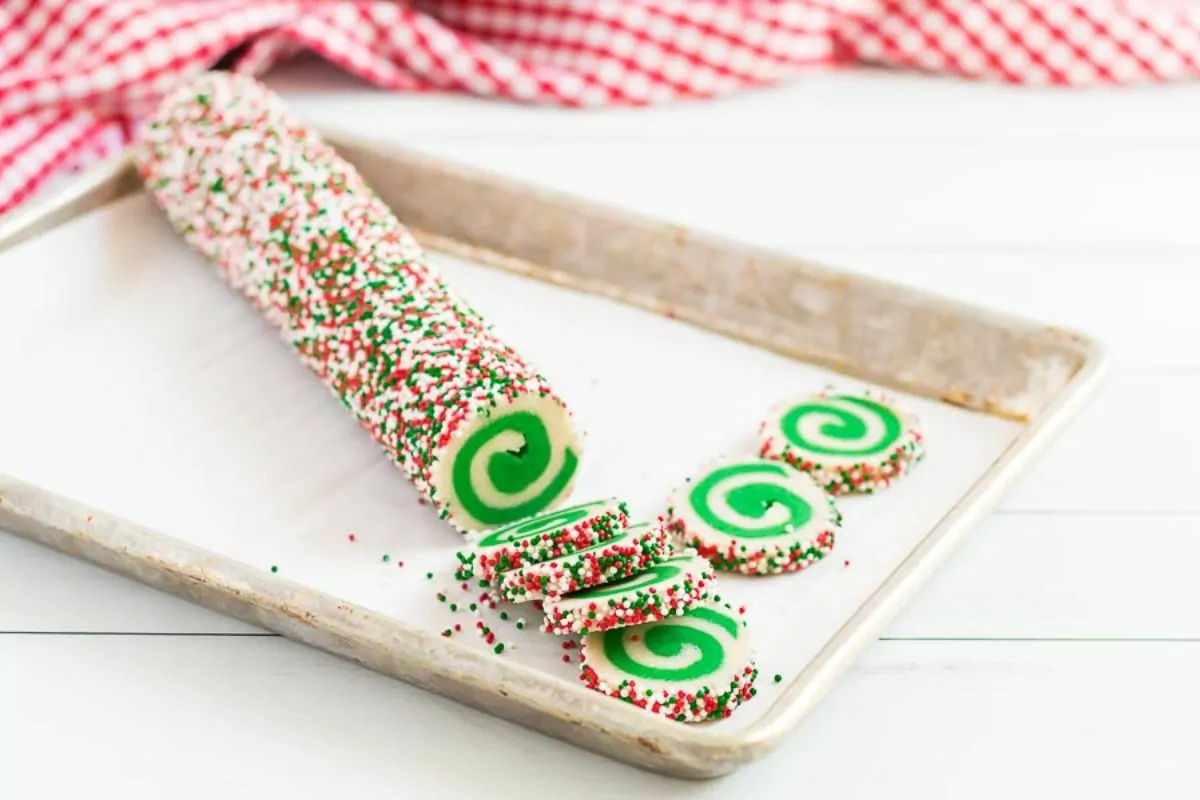 cylinder of cookie dough with sprinkles.