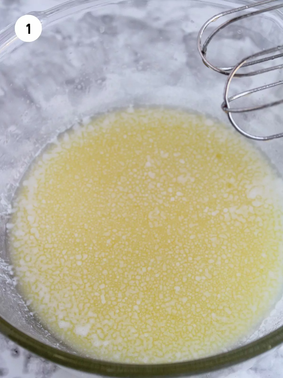 melted butter in a glass mixing bowl