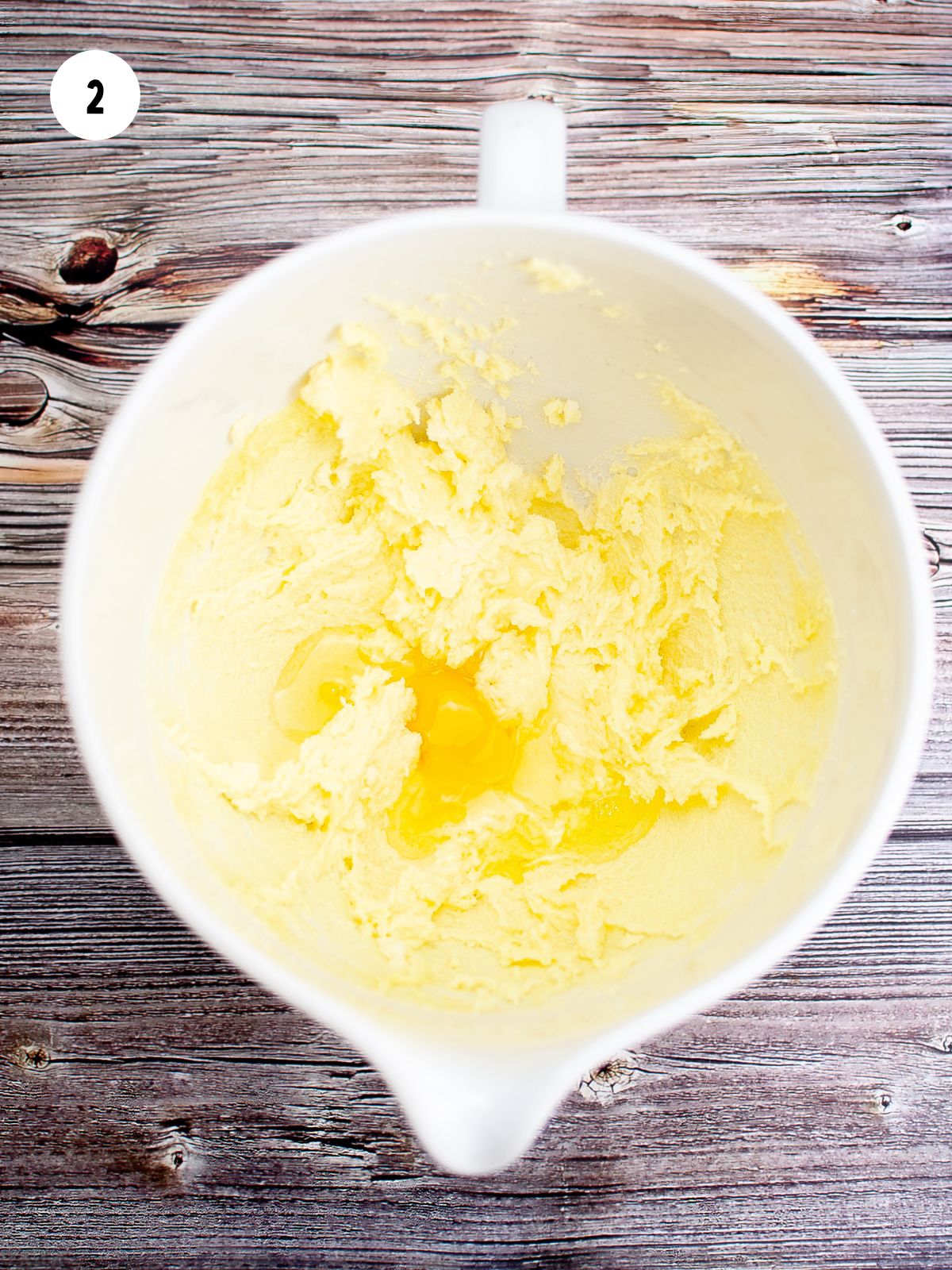 eggs being mixed into the butter mixture