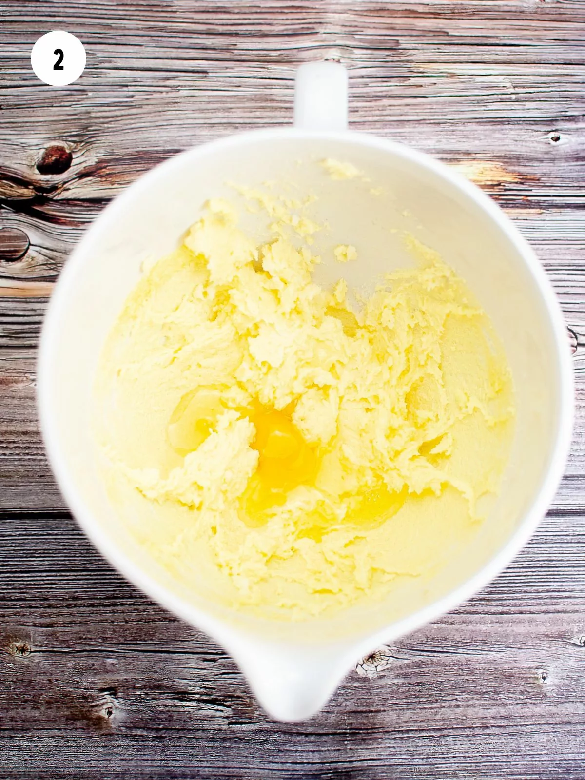 eggs being mixed into the butter mixture